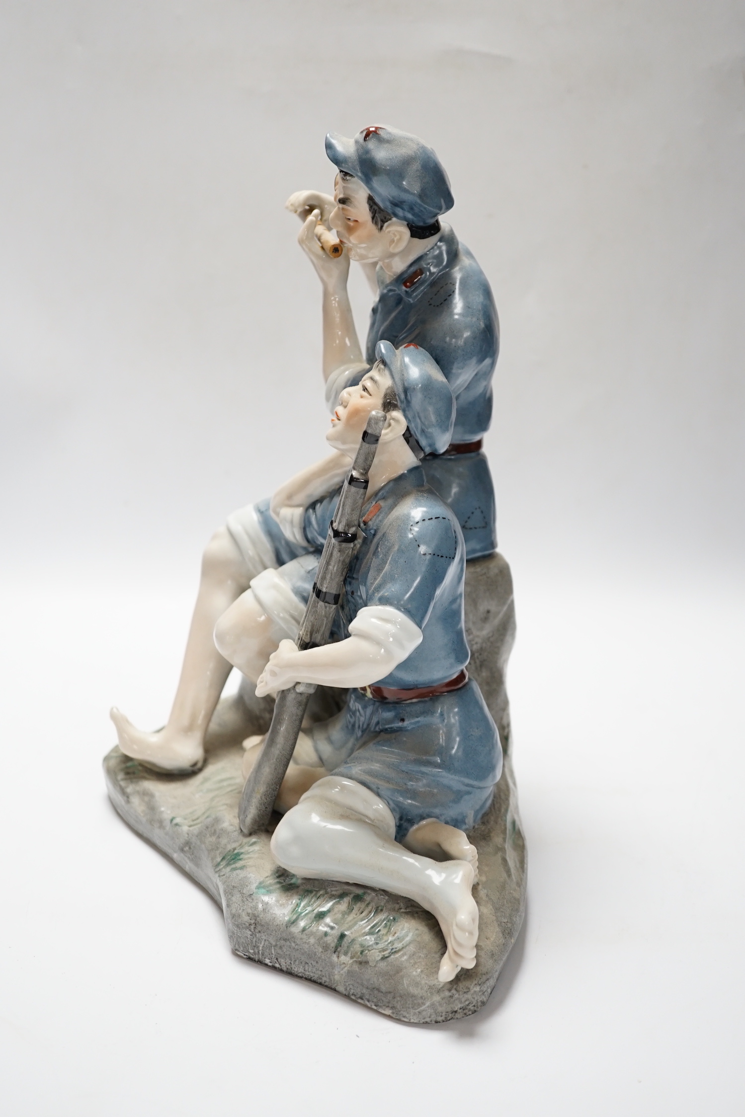 A Chinese Cultural revolution figure group, communist soldiers, 32cm high